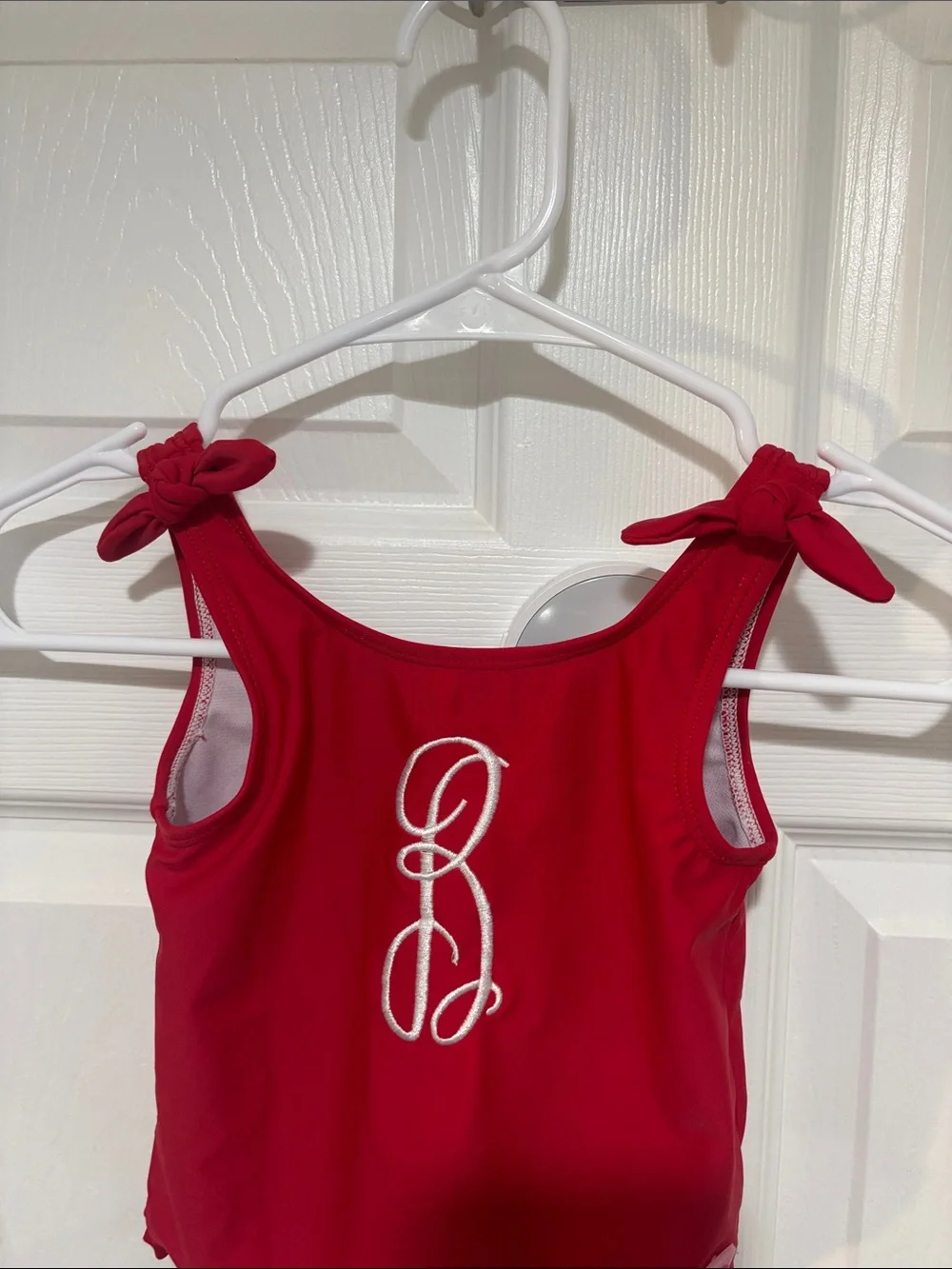 Ruffle Butts Red Girls One-Piece Swimsuit with “B” monogram